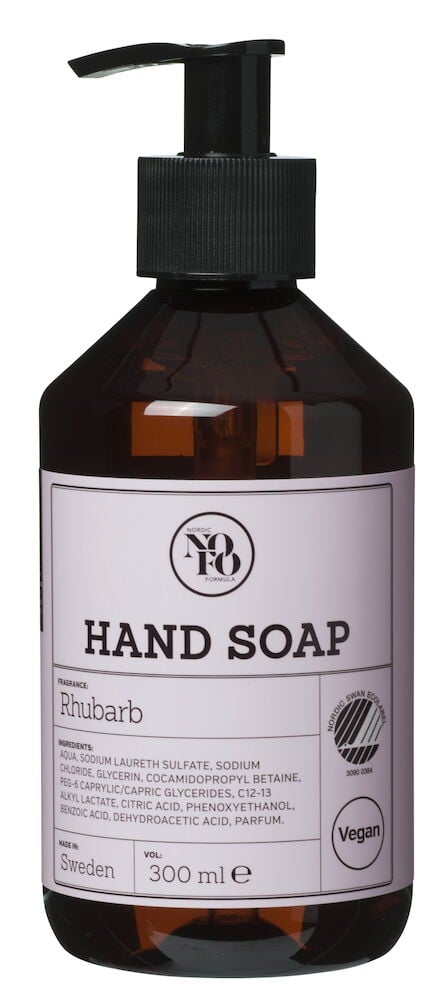 Brun plastflaska med pump och rosa etikett.