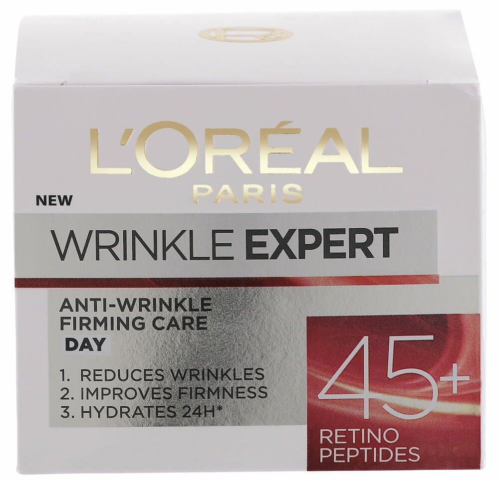 Hvit kartong med gullfarget L’Oréal Wrinkle Expert tekst.