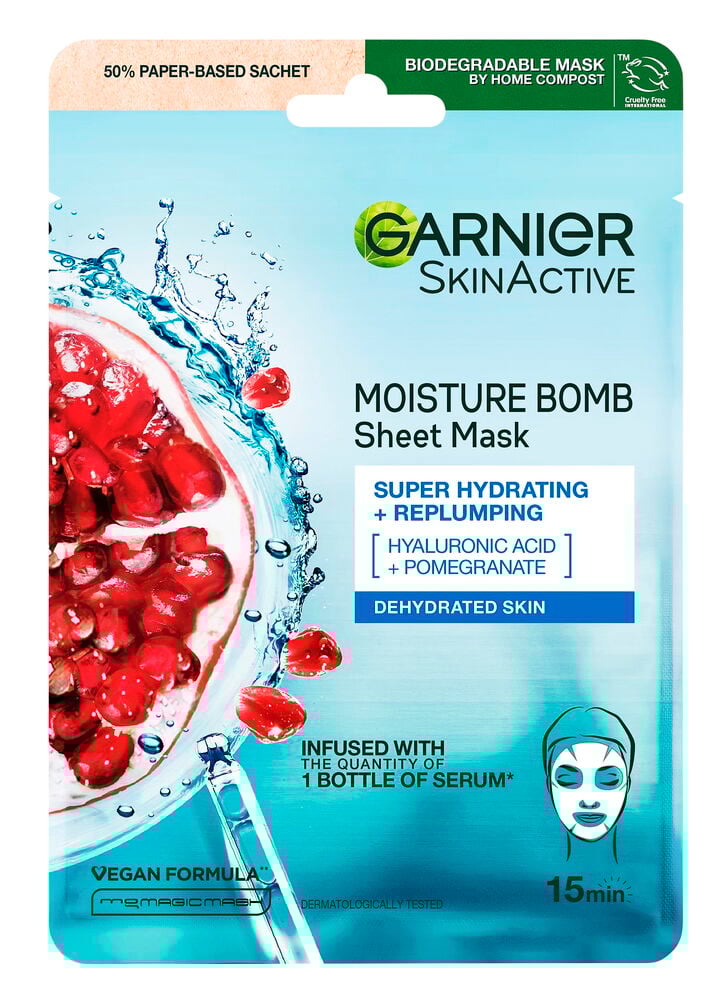 Sininen Garnier-kangasnaamio granaattiomenalla ja vesiroiskeilla.