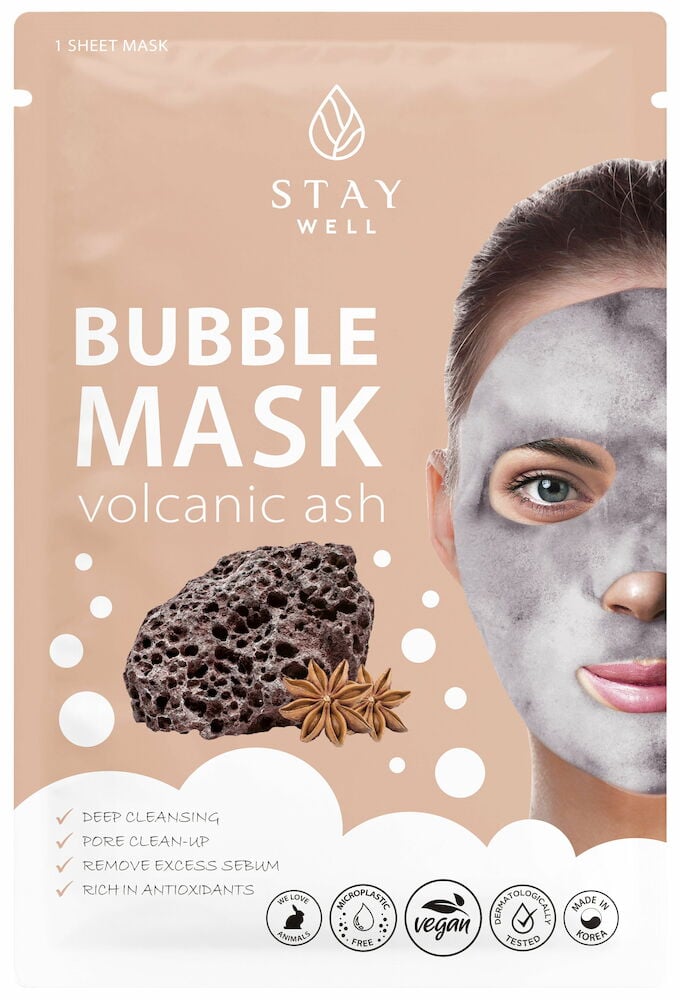 Verpackung mit Gesichtsmaske, Blasen und vulkanischer Asche.