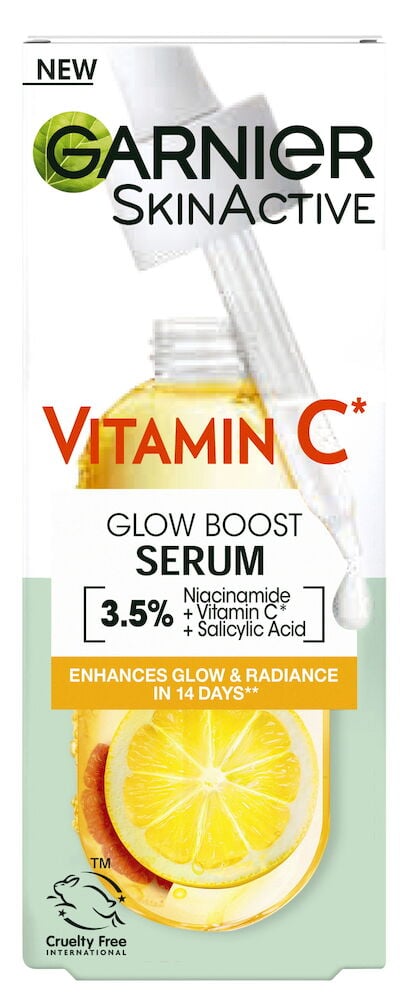 Glassflaske med pipette og sitronskiver på emballasjen.