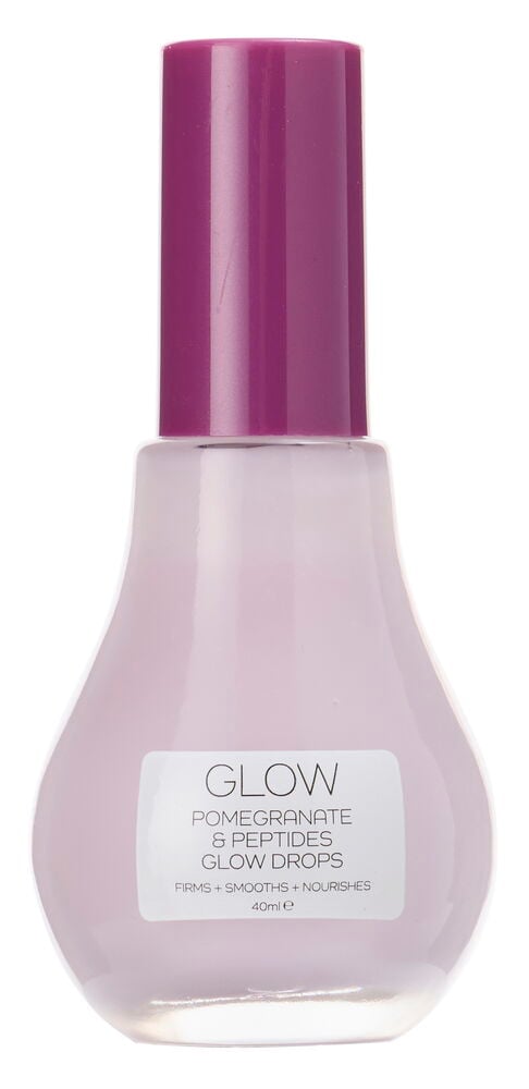 En lys lilla Glow Drops Glow 40 ml Pomegranate flaske med en mørk lilla kork og hvit etikett.