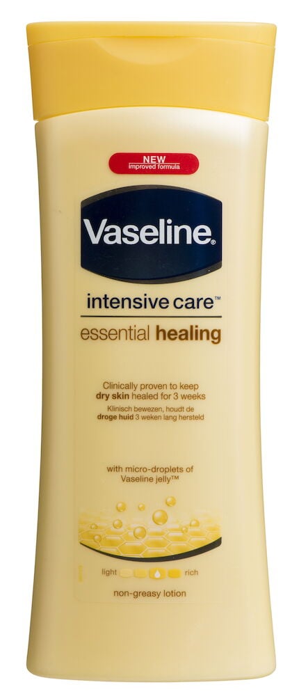Eine 400 ml Körperlotion Vaseline Intensive Care Essential Healing in einer hellgelben Flasche mit gelbem Klappverschluss.