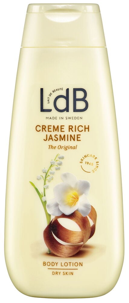 Lys gul flaske bodylotion med blomster- og nøttemotiv.