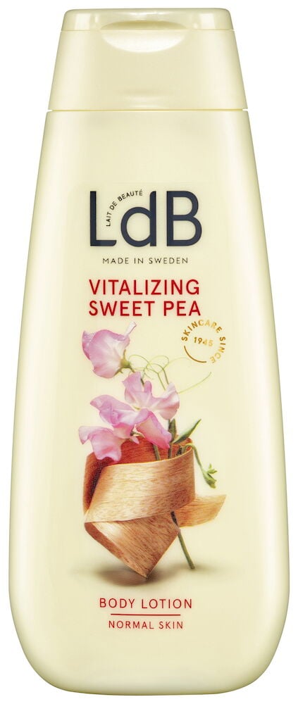 Beige plastflaska med blommotiv och rött texttryck.