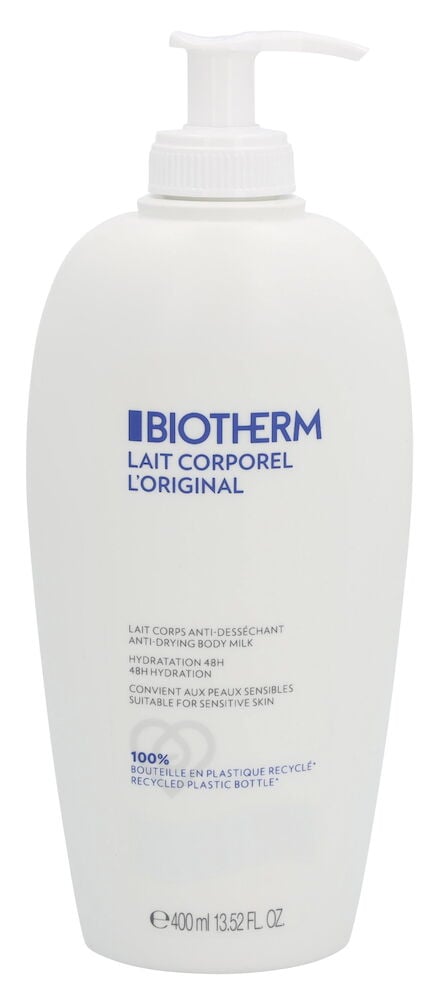 Hvit plastflaske med pumpe og blå tekst.