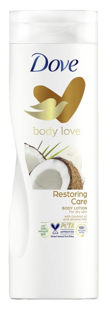 Vit Dove bodylotionflaska med kokosnötsmotiv på etiketten.