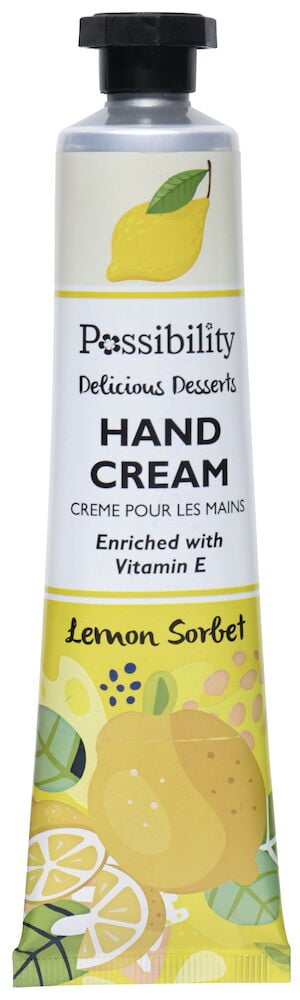 Tub med handkräm, citrondesign och svart lock.