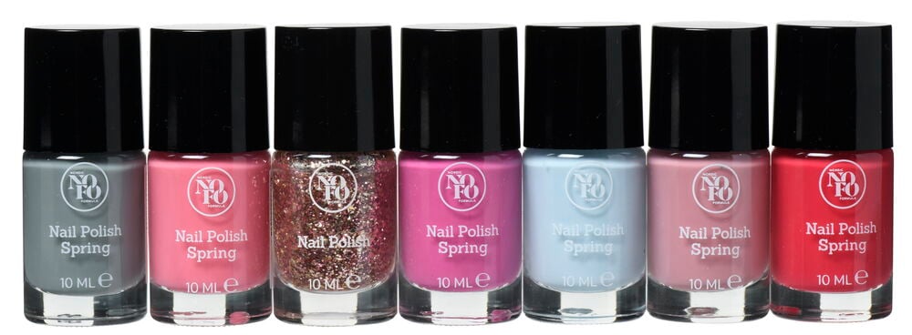 Sju flaskor färgglatt nagellack i glas med svarta lock.