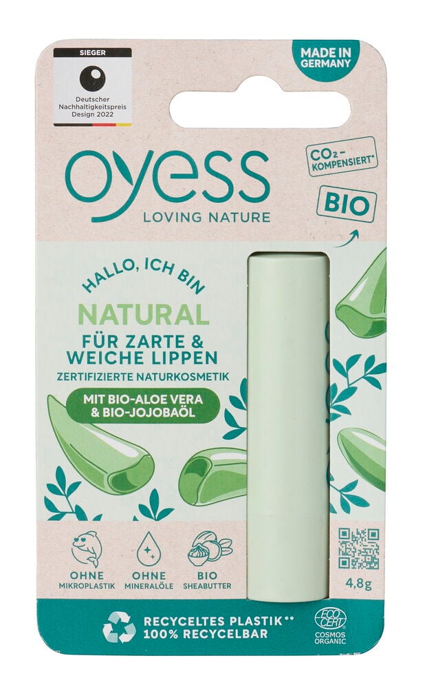 Ein natürlicher 4,8g Lippenbalsam in hellgrüner und beiger Verpackung, der einen hellgrünen Stift zeigt.