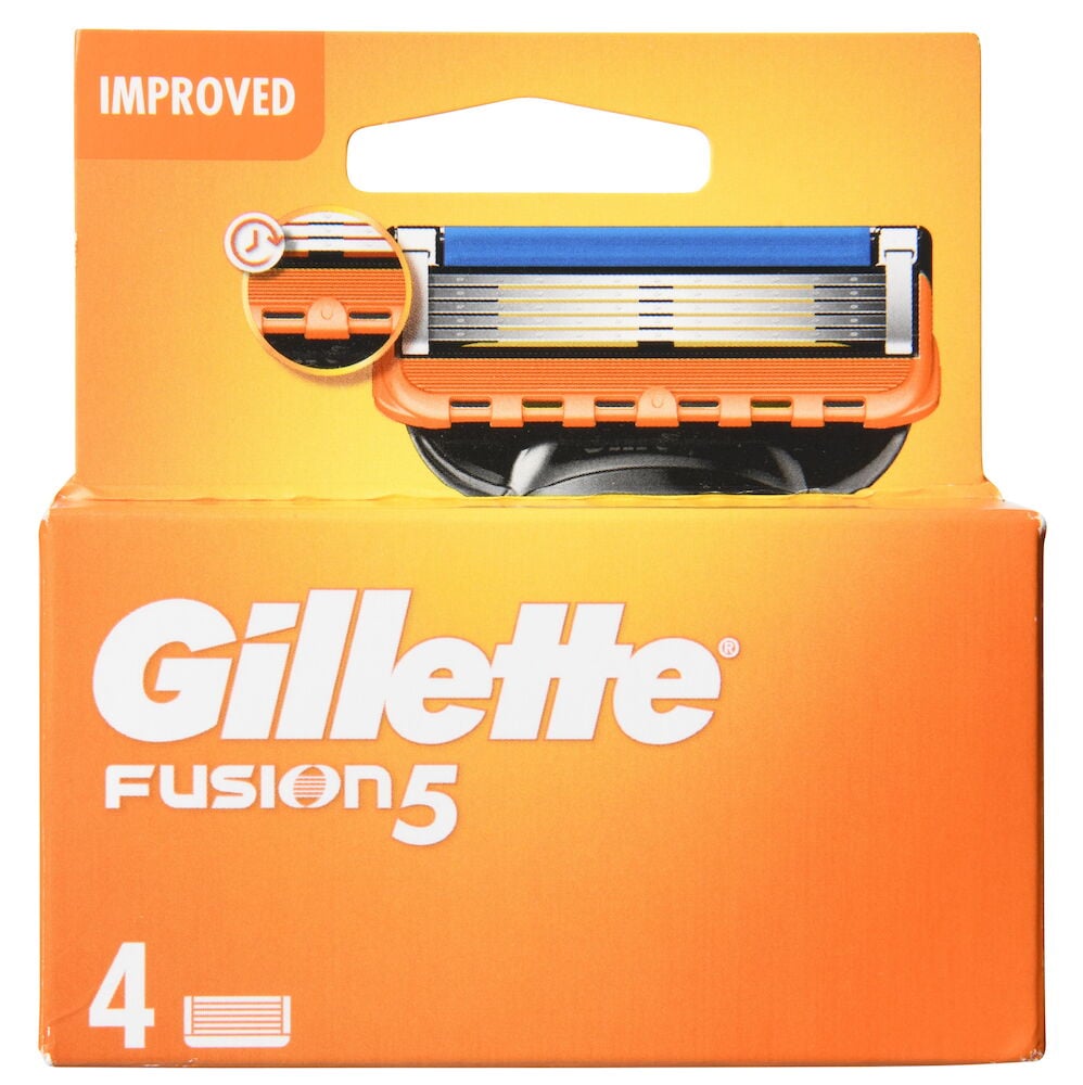 Orange förpackning med fyra Gillette Fusion5 rakblad.