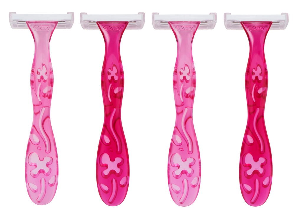 Neljä vaaleanpunaista partahöylää, joiden kahvassa on kukkakuvio.