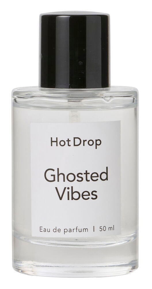 En klar glassflaske Eau de Parfum HotDrop 50 ml Ghosted Vibes med sort kork og hvit etikett.