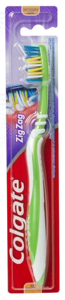Grön Colgate tandborste med mjuka borst i förpackning.