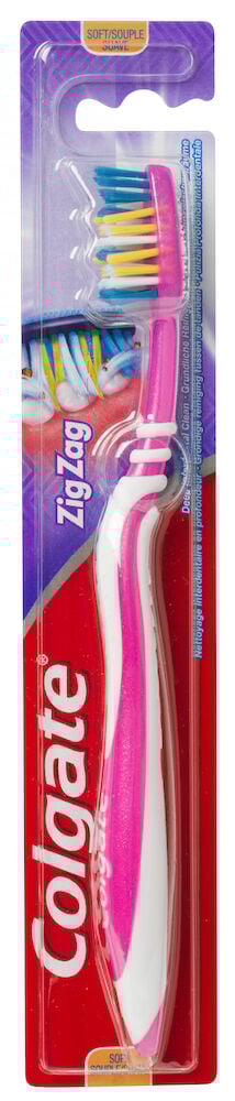 Rosa och vit colgate tandborste i förpackning.