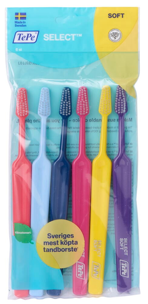 Sex färgglada mjuka tandborstar i plastförpackning.