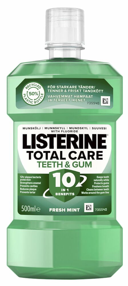 Grønn flaske Listerine munnskyll for tenner og tannkjøtt.