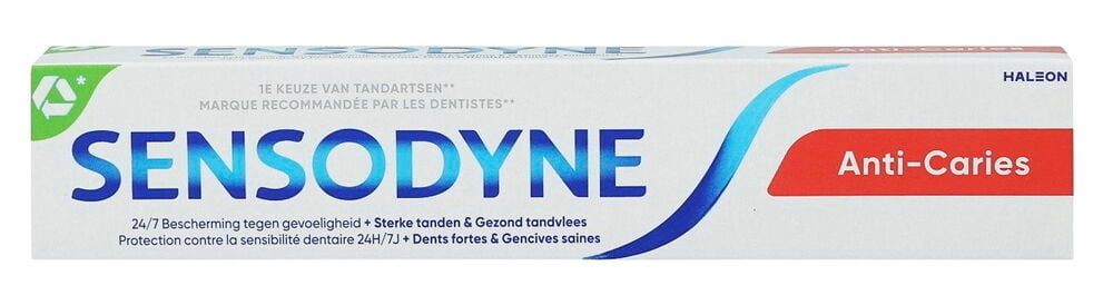Zahnpasta Sensodyne 75 ml Anti Caries, eine weiße Schachtel mit blauem Sensodyne-Logo und rotem Anti-Karies-Etikett.