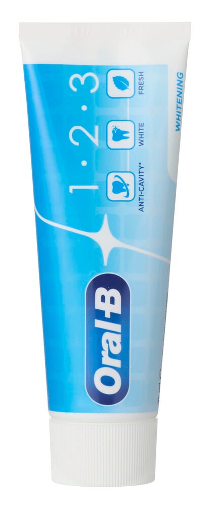 Eine blau-weiße Zahnpastatube zur Zahnaufhellung mit 1.2.3 Symbolen für Kariesschutz, Weiß und Frische.