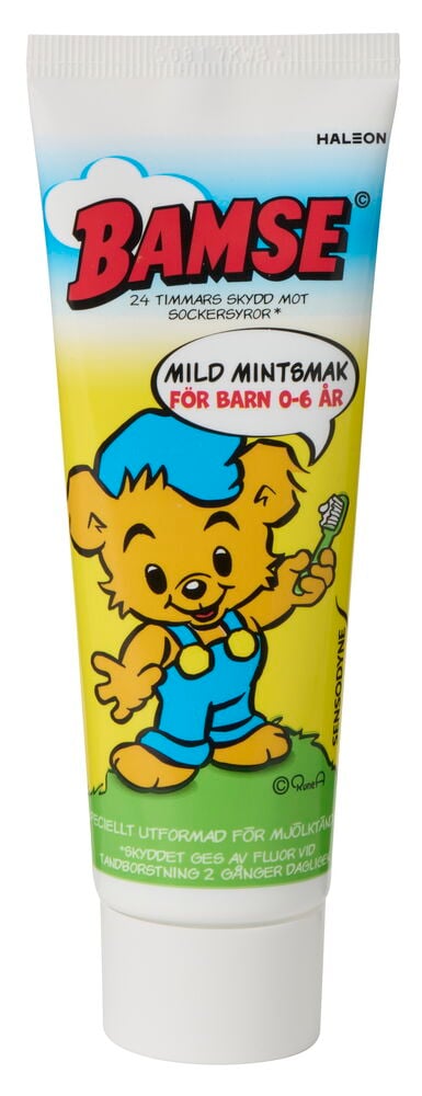 Valkoinen ja keltainen Bamse lasten miedon mintunmakuinen hammastahna-tuubi sarjakuvakarhulla.