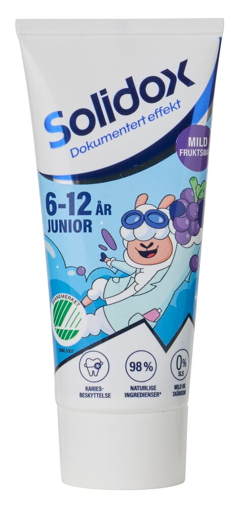 En hvit tube Solidox barnetannkrem (6–12 år) med blå grafikk og en tegnet lammefigur.