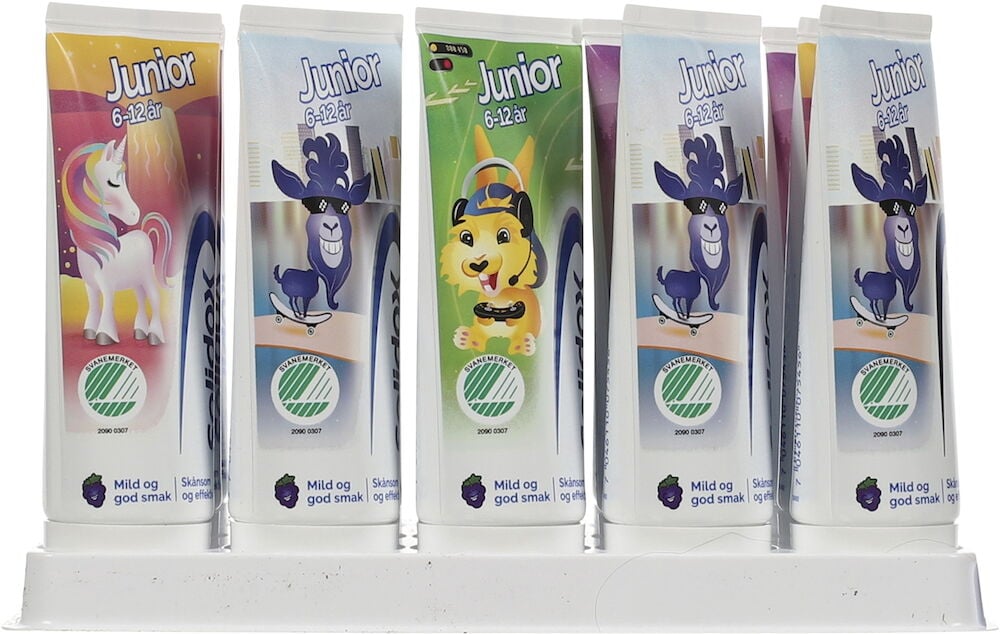 Flere tannkremtuber for barn med fargerike dyremotiver.