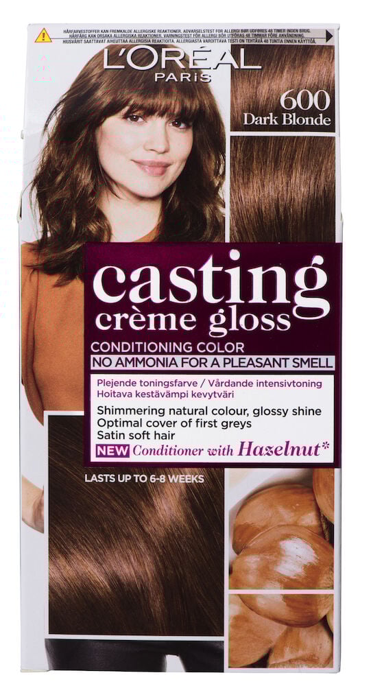 Kvinna med mellanblont hår på hårfärgsförpackning.