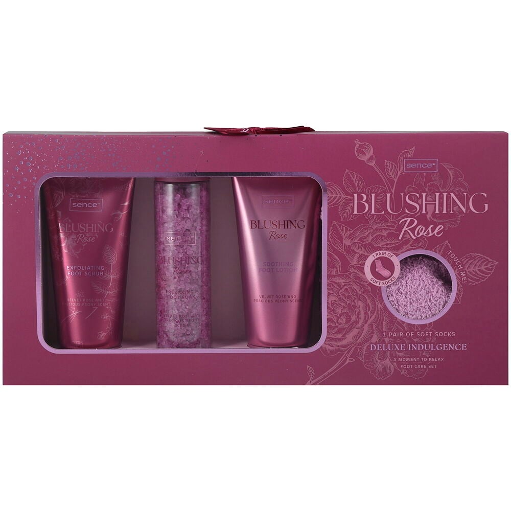 Et Blushing Rose fotpleiesett med eksfolierende skrubb, fotbad, beroligende lotion og myke sokker.
