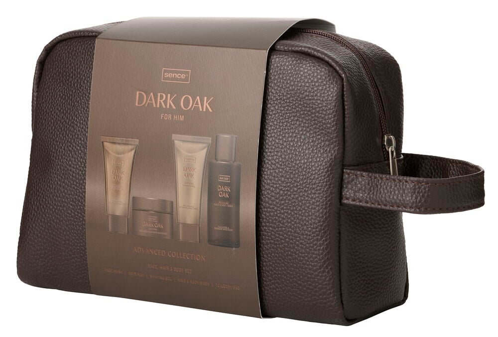 Mørk brun teksturert toalettmappe med glidelås og håndtak, inneholder fire Dark Oak groomingprodukter i gavehylse.
