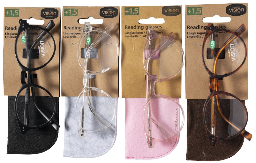 Neljä lukulasia eri väreissä koteloineen.