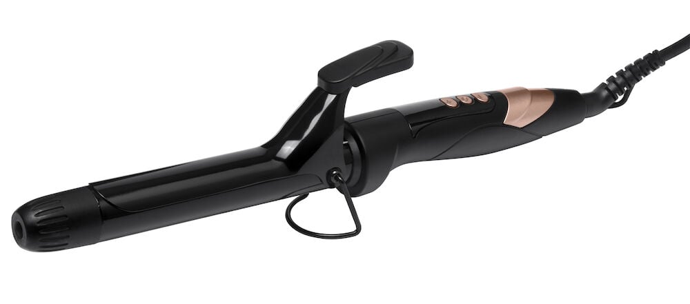 Svart och roséfärgad locktång med digital display.