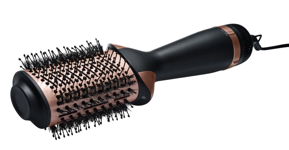 Musta ja roosa kuumailmaharja pyöreällä harjalla.