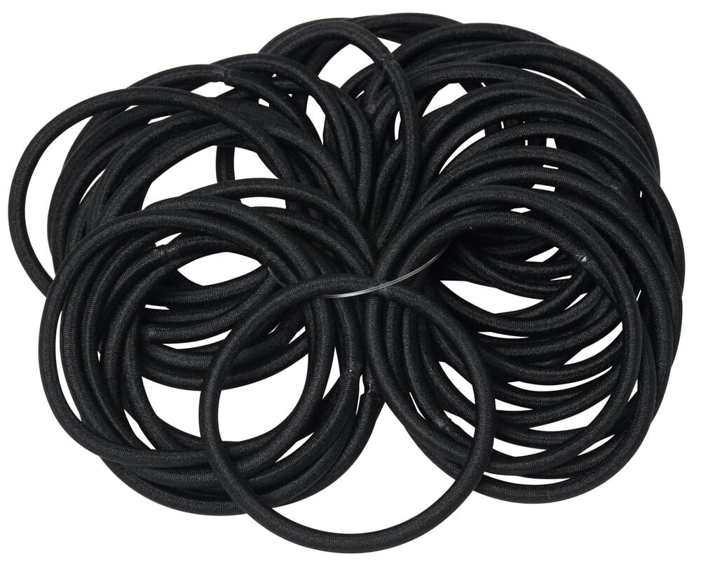 Svarta elastiska hårsnoddar i en stor hög.