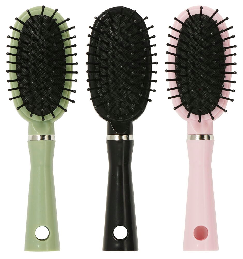 Tre små ovalformede hårbørster i forskjellige farger.