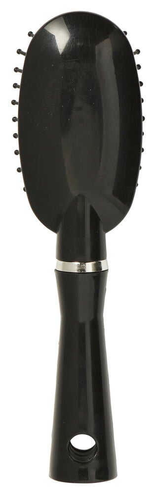 Liten svart oval reisehårbørste med børstepigger.