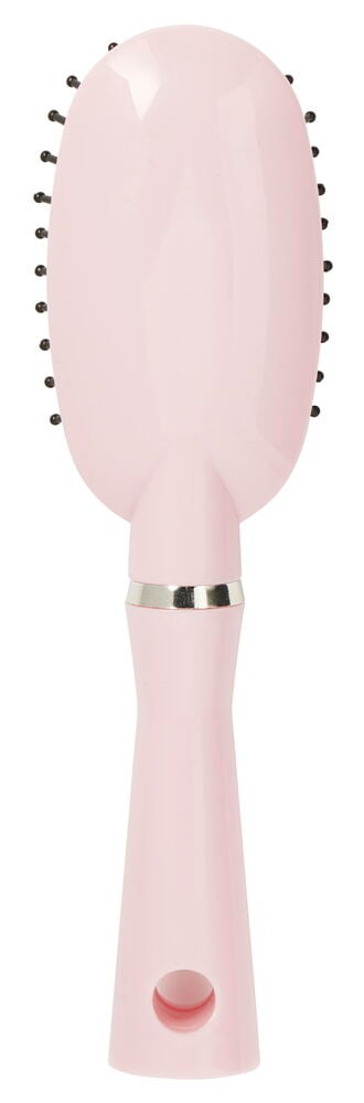 Liten rosa hårbørste med ovalt børstehode.