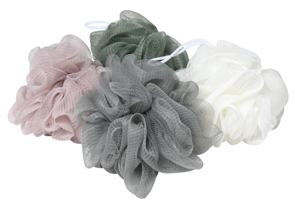 Fyra duschbollar i olika färger på rad.