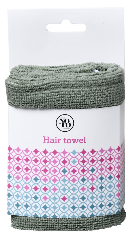 Grön hårturban av mikrofiber i förpackning.