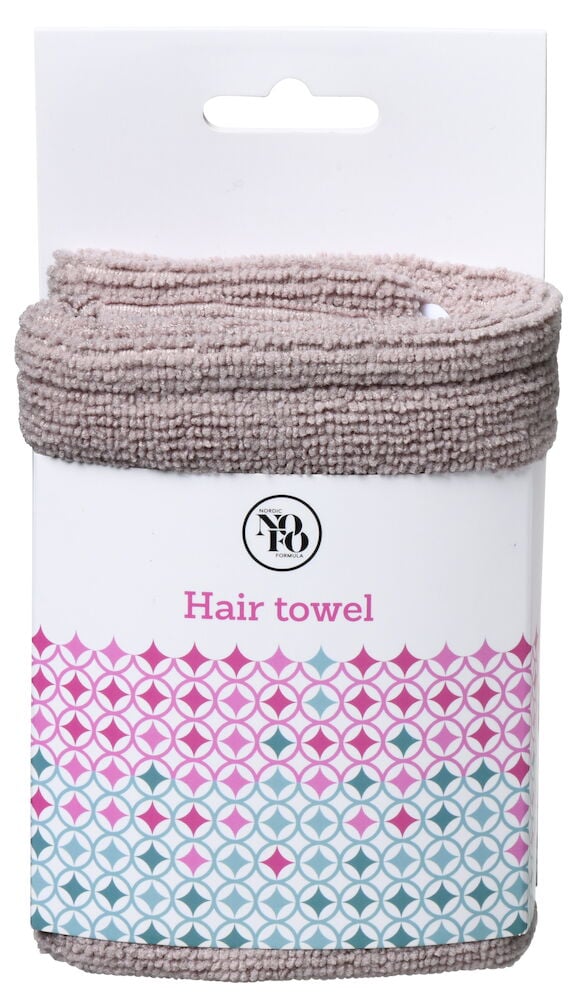 En vikt beige hårturban i microfiberförpackning.