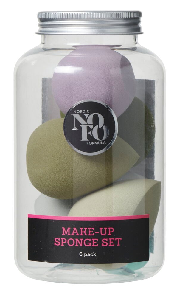 Sex sminksvampar i olika färger i plastburk.