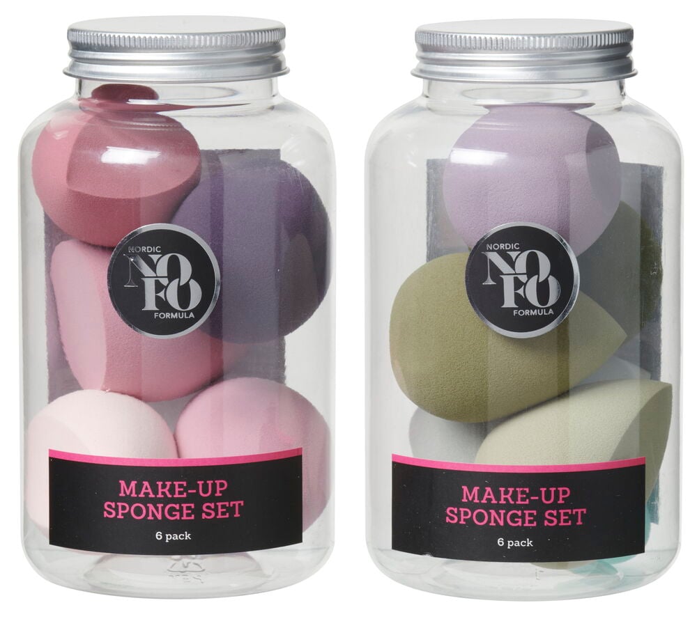 Sex sminksvampar i olika färger i plastburk.