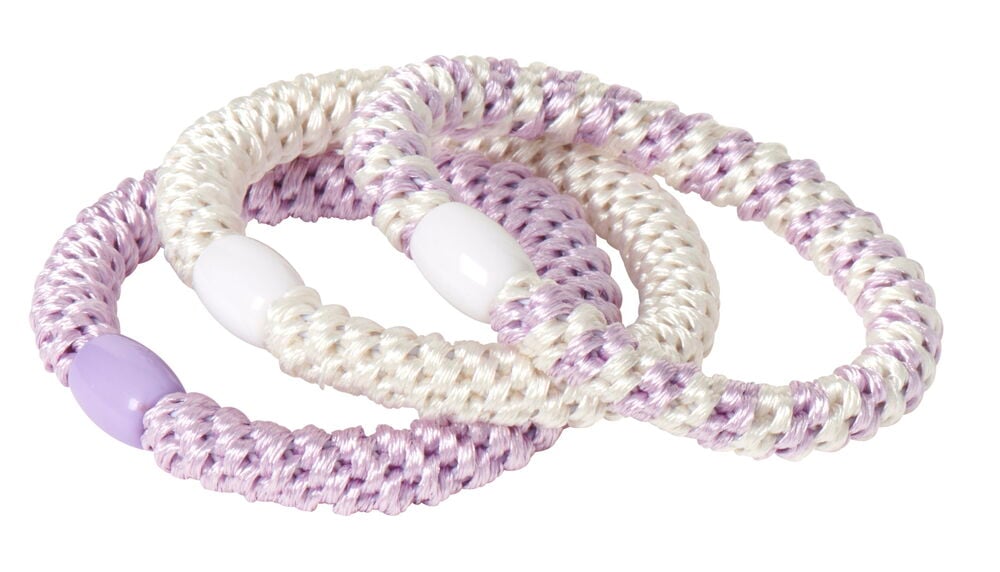 Tre lila och vita hårsnoddar i spiralform.