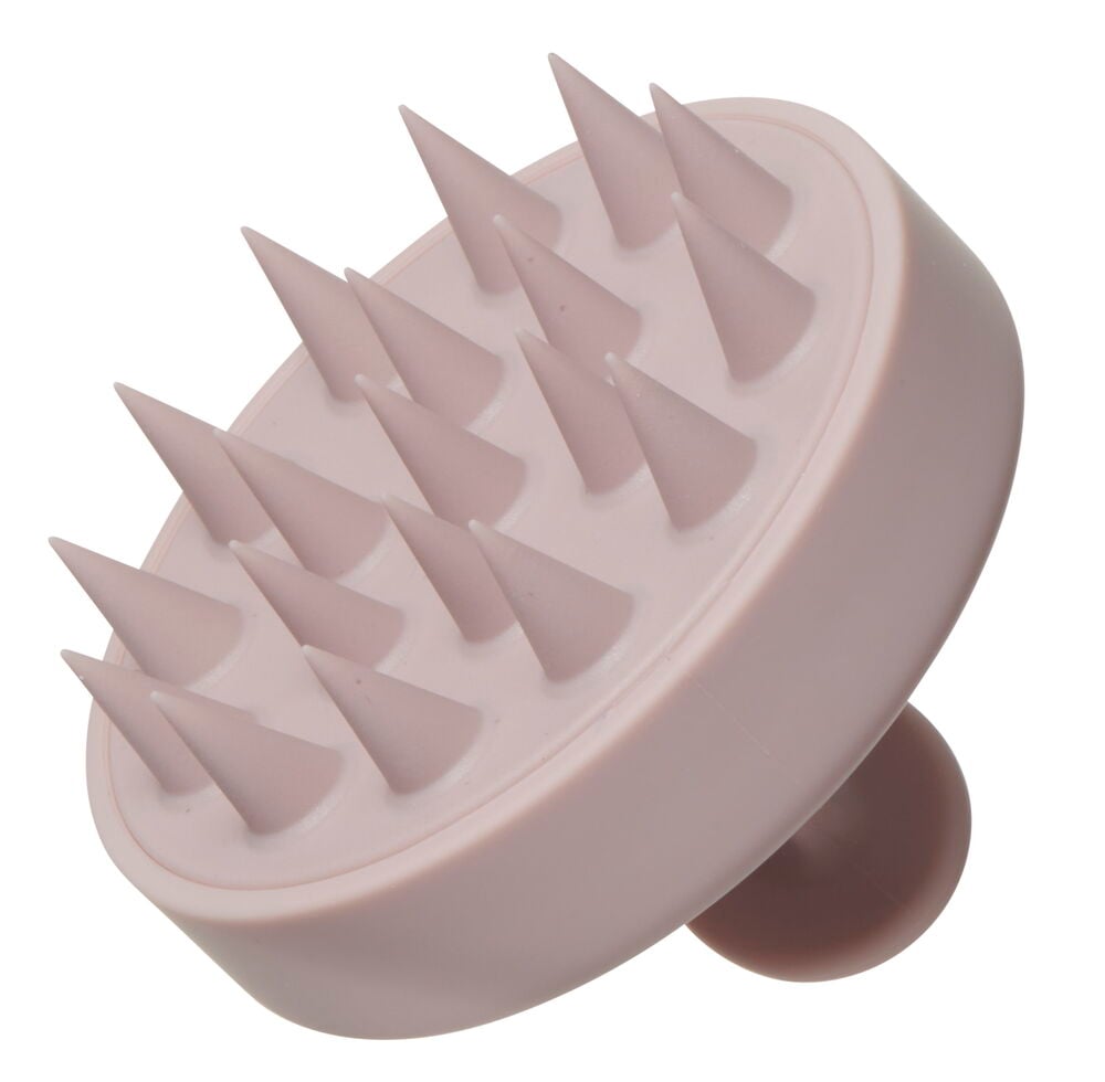 Ljusrosa schampoborste med mjuka piggar för hårbotten.