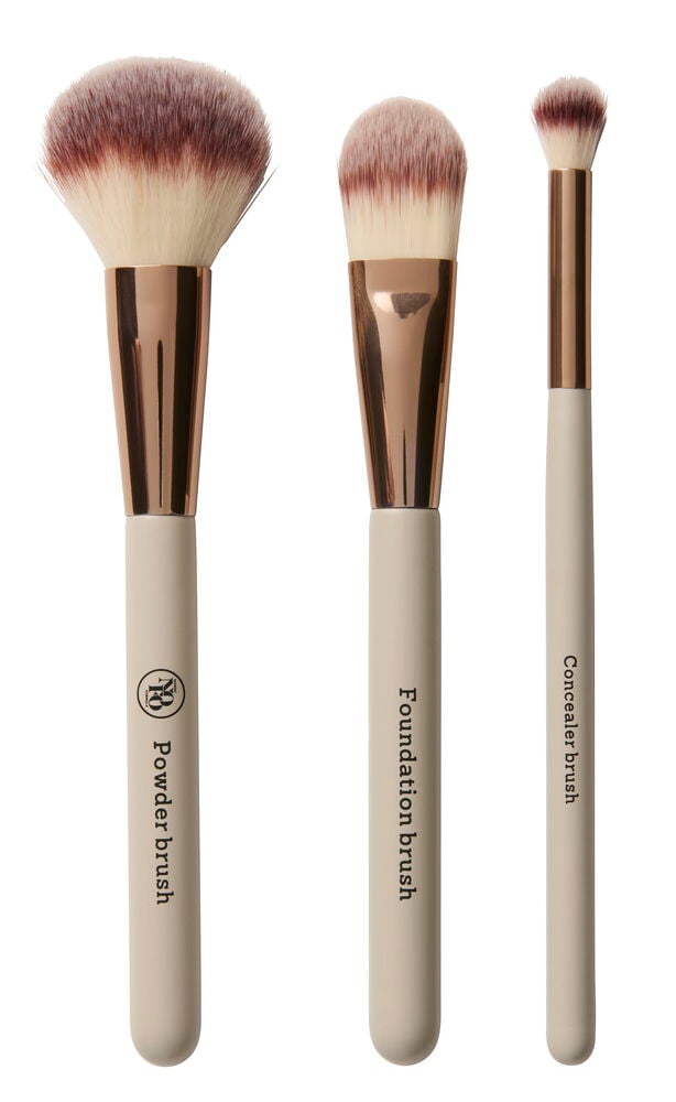 Make-Up-Pinsel satz NoFo 3 Teile: Puder-, Foundation- und Concealerpinsel mit Roségoldzwingen und beigen Griffen.