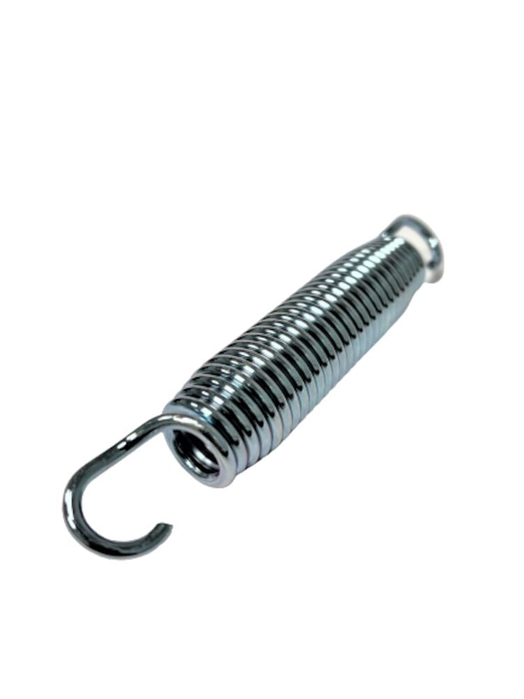 Metallijousi trampoliinille valkoisella taustalla.