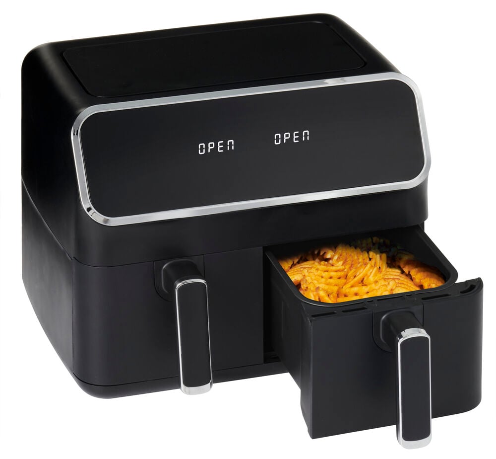 Svar svart dubbel airfryer med öppen låda pommes.