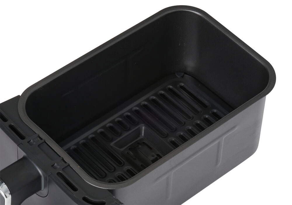 Svart luftfritöskorg med non-stick beläggning.