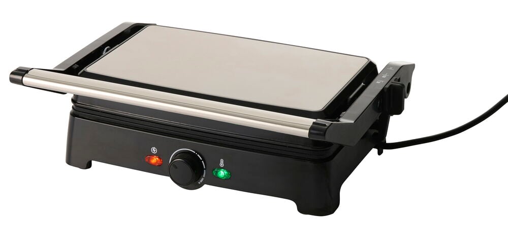 Multigrill 1500 W TGM26, ein schwarzer und silberner Elektrogrill mit Drehknopf und zwei Kontrollleuchten.