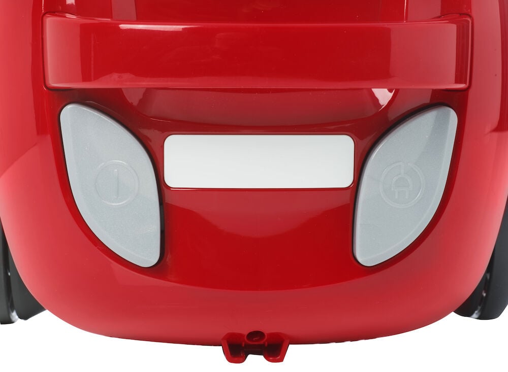 Röd kompakt dammsugare med två grå knappar.