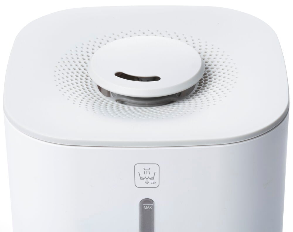 Hvit luftfukter med rund justerbar damputslipp.